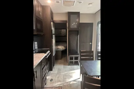 Moira's Mansion 2022 Grand Design Momentum Toy Hauler