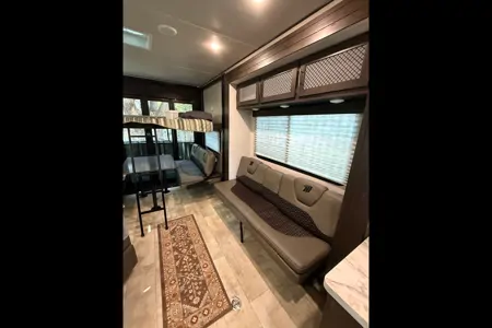 Moira's Mansion 2022 Grand Design Momentum Toy Hauler