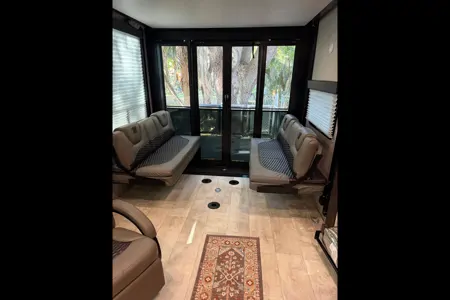 Moira's Mansion 2022 Grand Design Momentum Toy Hauler