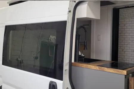 Cozy custom crafted van with Shower, Toilet, A/C , Heat, Solar and more