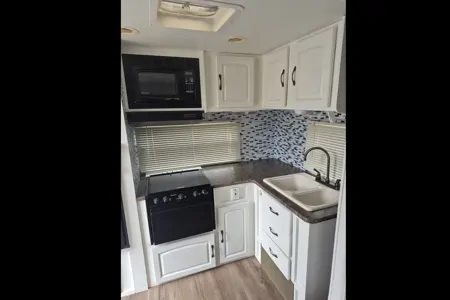 Eric & Sue,s Forest River Surveyor Travel Trailer