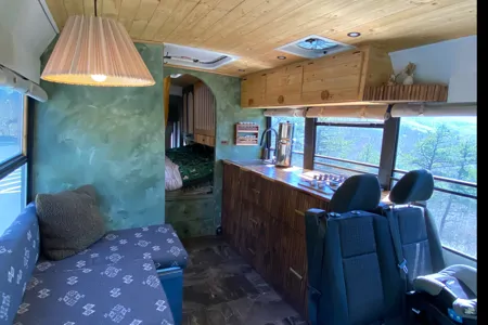 Luxury School Bus Conversion with 3 seatbelts!