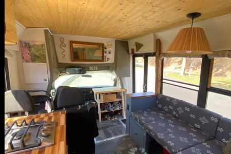 Luxury School Bus Conversion with 3 seatbelts!