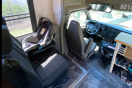 Luxury School Bus Conversion with 3 seatbelts!