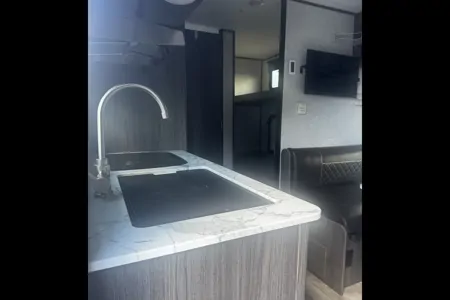 the Neville's Keystone Kodiak Club/175BH Travel Trailer
