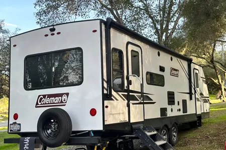 Private enterance  32’ Coleman Travel Trailer 