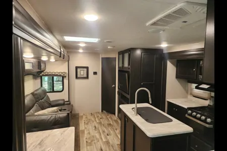 Ray Rays Travel Trailer with outdoor kitchen and bunk room