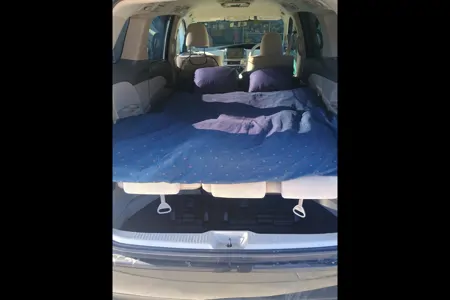 Toyota Campervan (7 seats/2 sleeps) Park Pass +Airport pickup