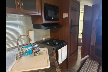 Laura's cozy Keystone Cougar Travel Trailer