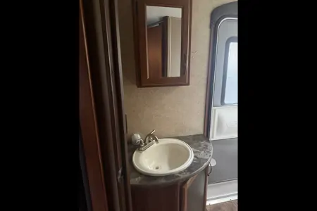 Laura's cozy Keystone Cougar Travel Trailer
