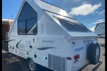 Musesica Forest River Flagstaff 12SDTH toy hauler A Frame Travel Trailer