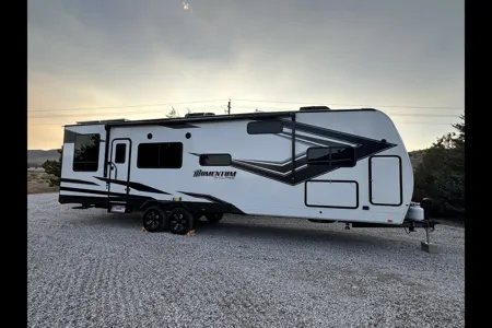 Reyes Family Grand Design Momentum 32G Toy Hauler