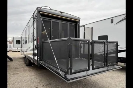 Reyes Family Grand Design Momentum 32G Toy Hauler