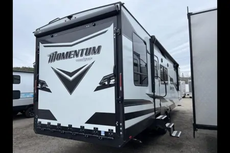 Reyes Family Grand Design Momentum 32G Toy Hauler