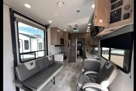 Reyes Family Grand Design Momentum 32G Toy Hauler