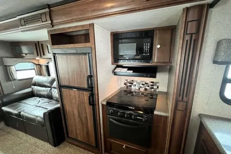 Leslie’s Happy Camper Heartland Trailside Travel Trailer