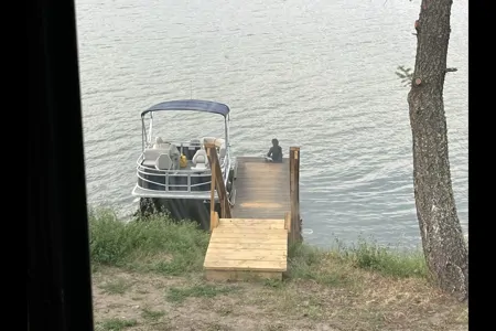 Waterfront RV Cottage WITH DOCK on Gorgeous Lac La Hache