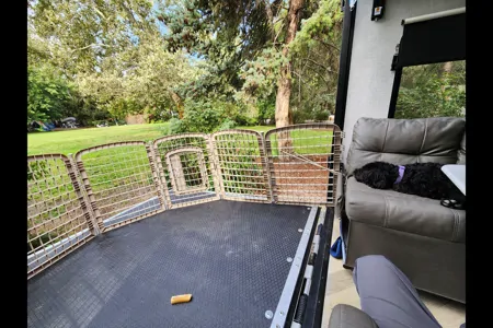Justin's Wildwood 211ssxl Toy Hauler / Open Living Dining and Patio