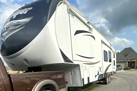 Bayou Ball Farms Forest River Sandpiper Fifth Wheel