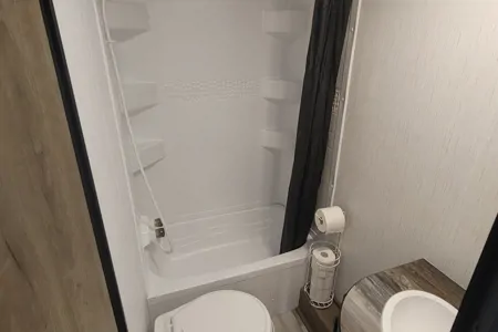 Family travels Heartland Pioneer BH280 Travel Trailer