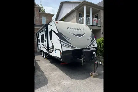 the 2pins Keystone passport ultra lite Travel Trailer