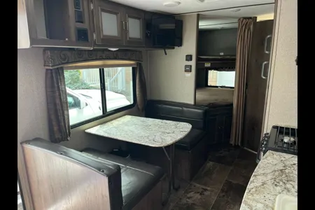 the 2pins Keystone passport ultra lite Travel Trailer