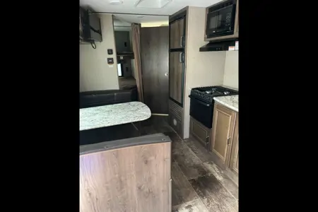 the 2pins Keystone passport ultra lite Travel Trailer