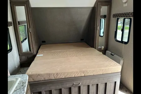 the 2pins Keystone passport ultra lite Travel Trailer