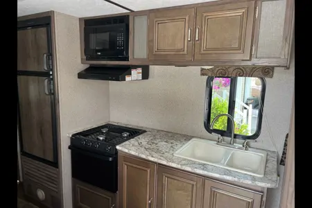 the 2pins Keystone passport ultra lite Travel Trailer