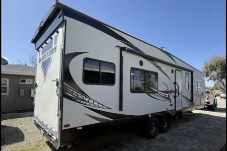 Raymond's Forest River Sandstorm 282SLR Toy Hauler