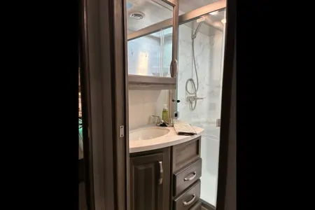 White Squirrel Keystone Cougar 24RDS Fifth Wheel