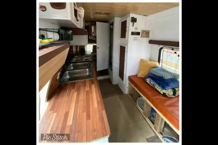 Meredith's Dodge Ram B350 Class C Camper Van