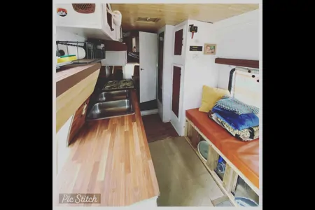Meredith's Dodge Ram B350 Class C Camper Van
