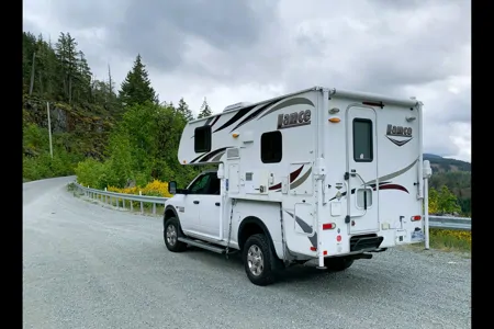 2016 4x4 RAM 3500HD with LANCE Truck Camper