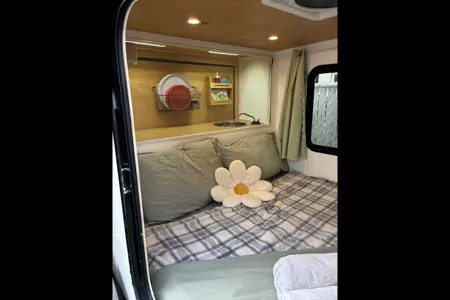 Spacious Square-Drop trailer with a small kitchen