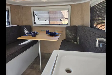 Brooke's cozy Scamp 13 ft Trailer