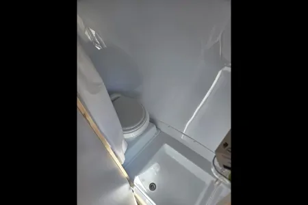 Brooke's cozy Scamp 13 ft Trailer