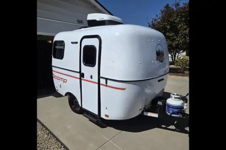 Brooke's cozy Scamp 13 ft Trailer
