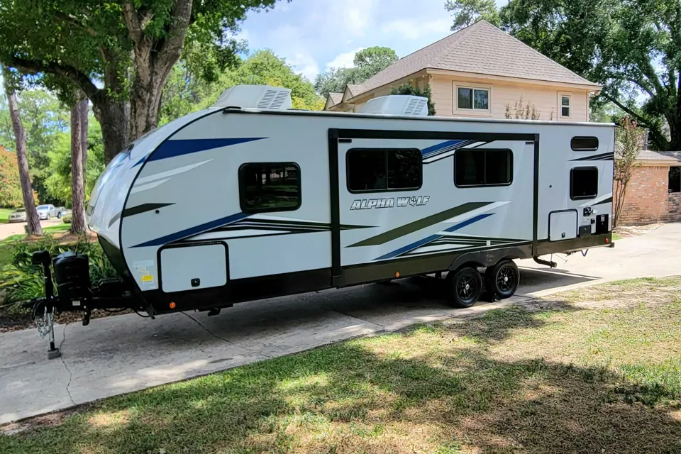 Hall Family's Alpha Wolf 26DBH-L Travel Trailer in New-Caney, Texas