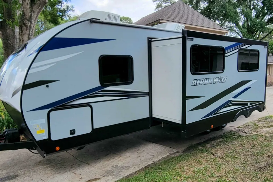 Hall Family's Alpha Wolf 26DBH-L Travel Trailer in New-Caney, Texas