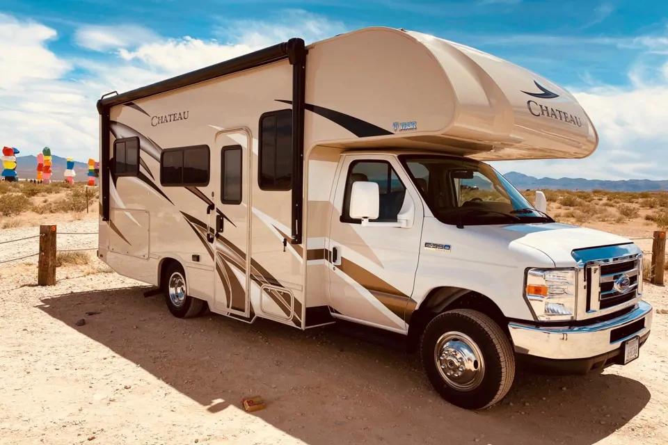 Thor Chateau parked in a desert campsite
