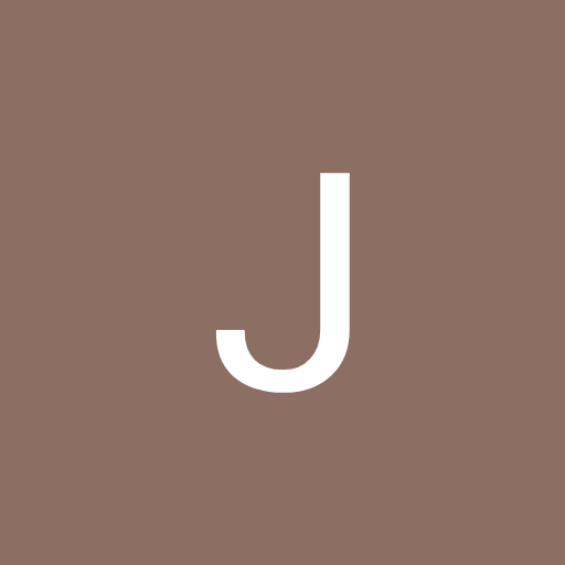 J.