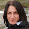 AT
