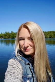 AT