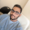 AT